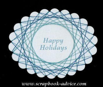 Spirella Design with Blue Threads & Happy Holidays Stamped in the center 