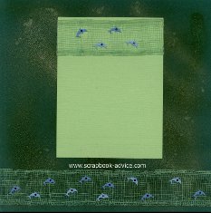 Bermuda Scrapbook Layout with background paper full photo of dolphin and matching page colored with green and gold glimmer mist, green coastal netting and blue porposie dolphin brads.