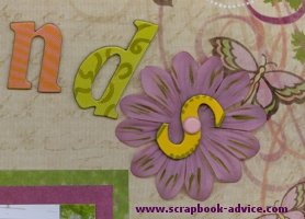 Scrapbook Brads used to attach chipboard letters