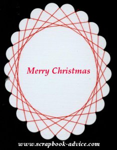 Spirella Design with Red Thread & Merry Christmas Stamped in the center Spirella Design with Red Thread & Merry Christmas Stamped in the center