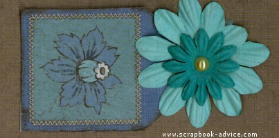 Personal Shopper Mar 2010 flower layout Pearl Scrapbook Brads used on scrapbook layout